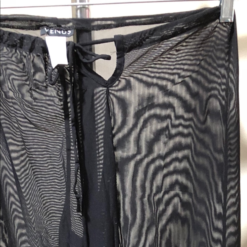 Swim suit cover up pants.
